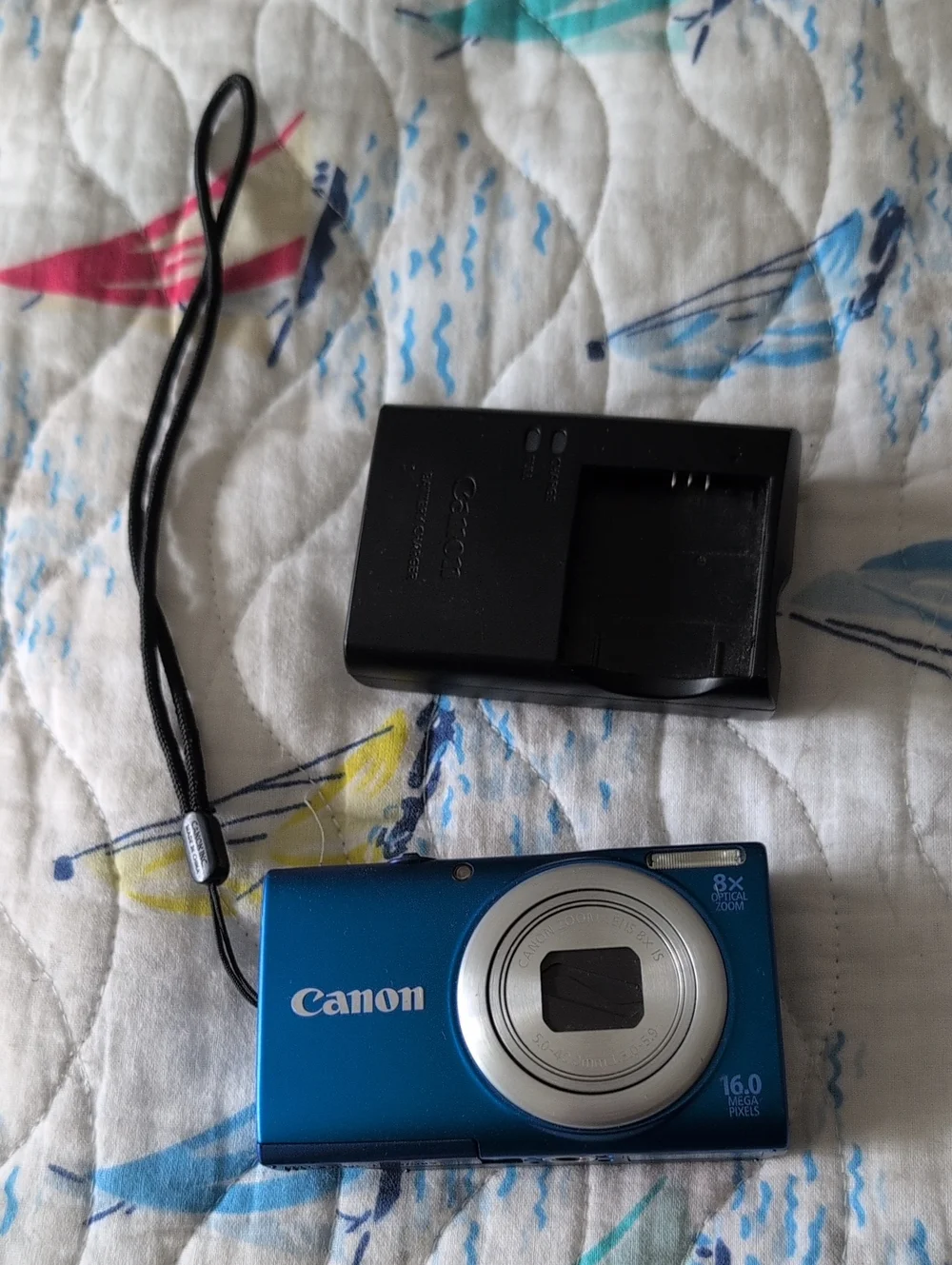 Canon Blue Compact Digital Camera with Wrist Strap and Charger